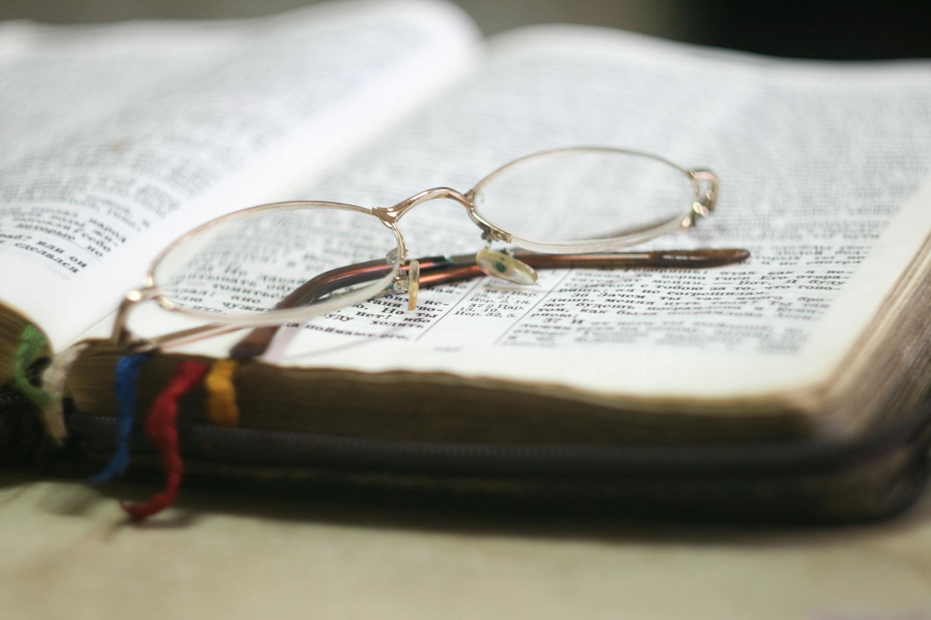Vision statement with glasses on a Bible